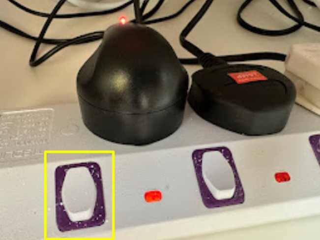 Power switch location for the Bluetooth adapter in the cupboard